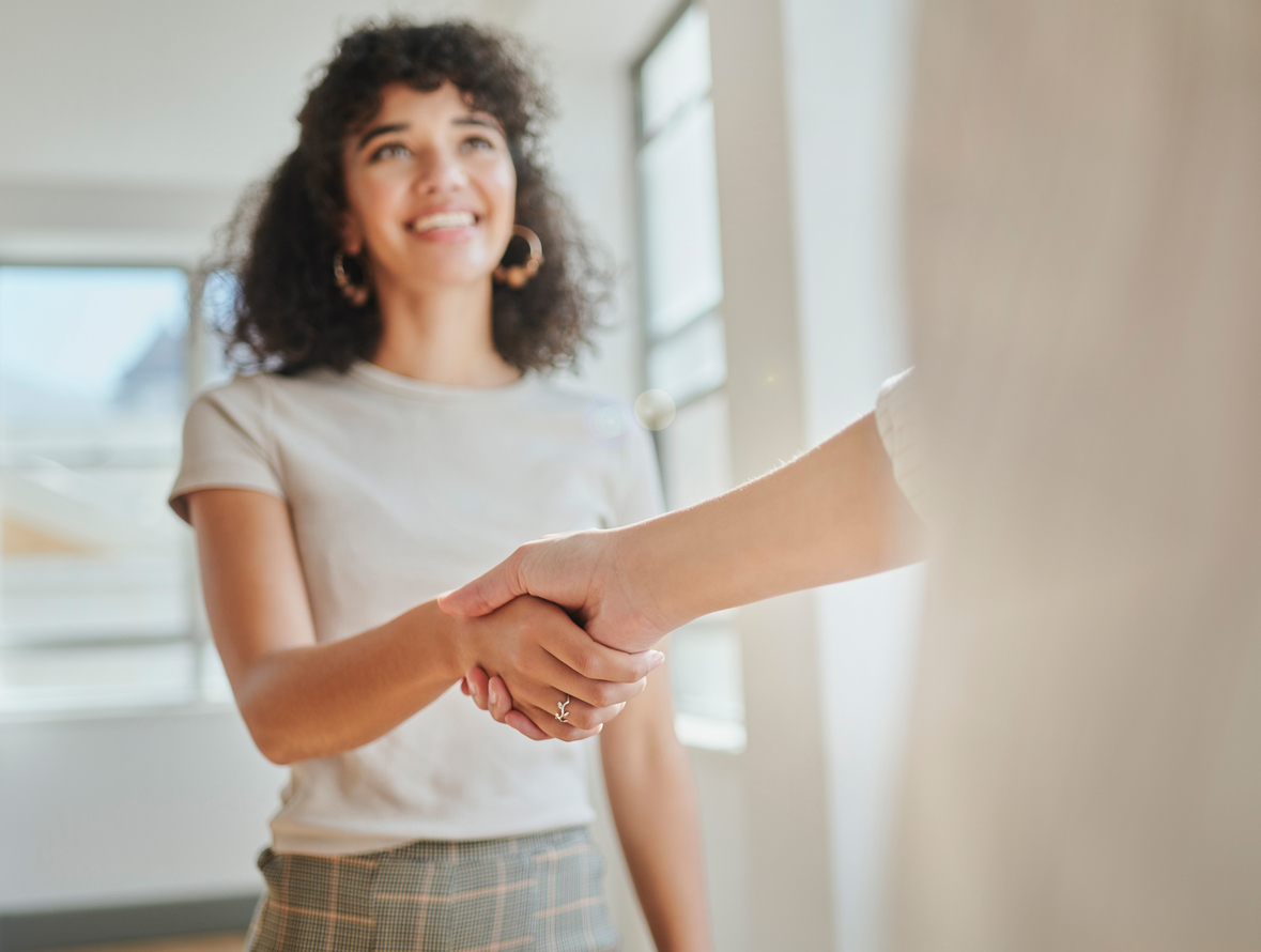 Lady in the office shaking hands